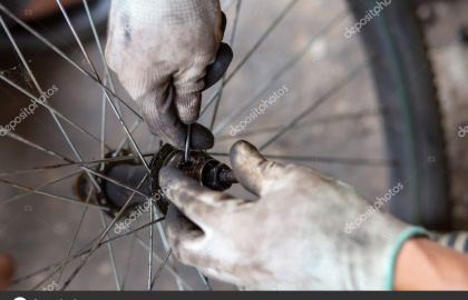 depositphotos-550837618-stock-photo-close-axle-bicycle-wheel-being